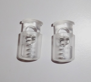 Koordstopper Cylinder 1-gaats 25mm (10 stuks), Transparant